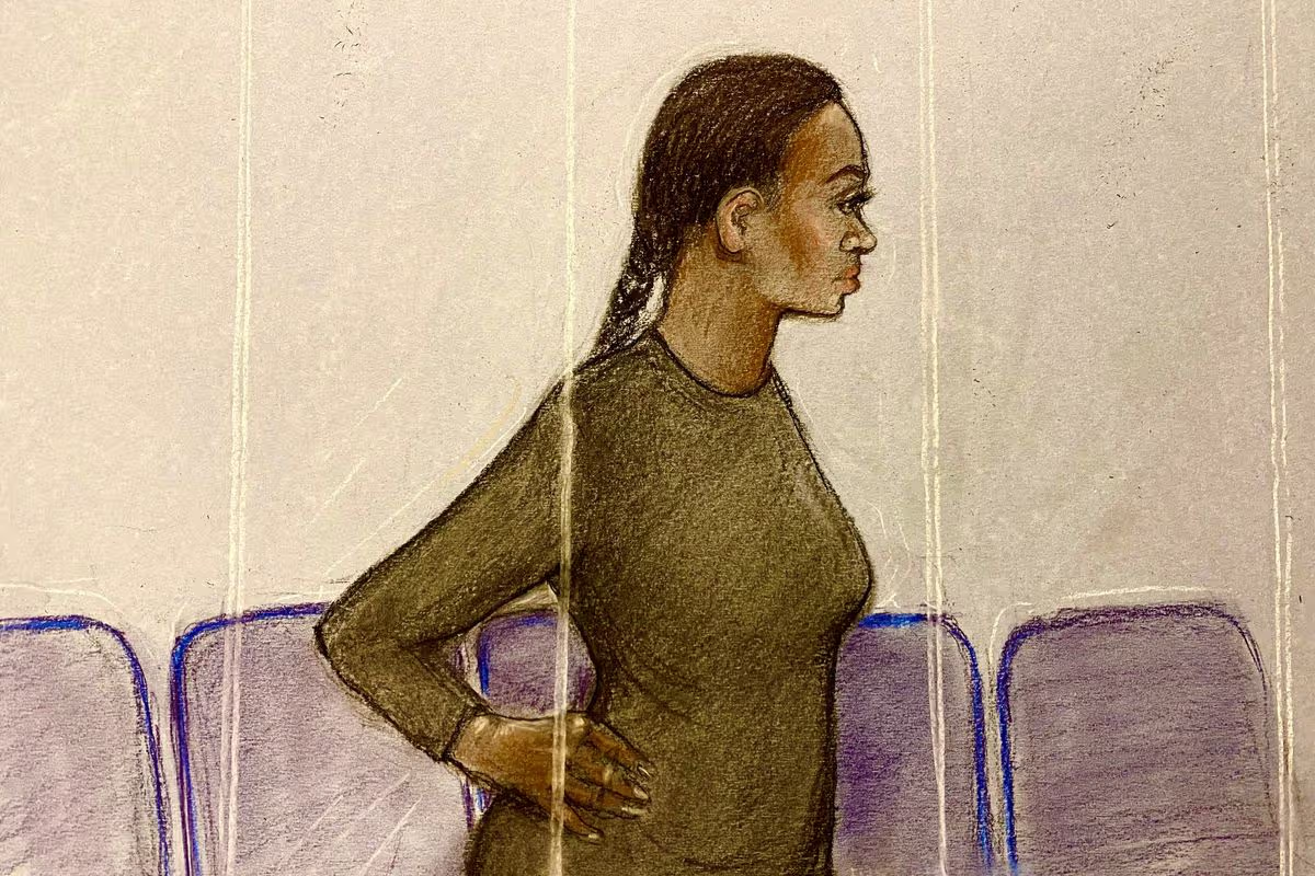 X Factor finalist facing attempted murder charge makes heart sign from dock
