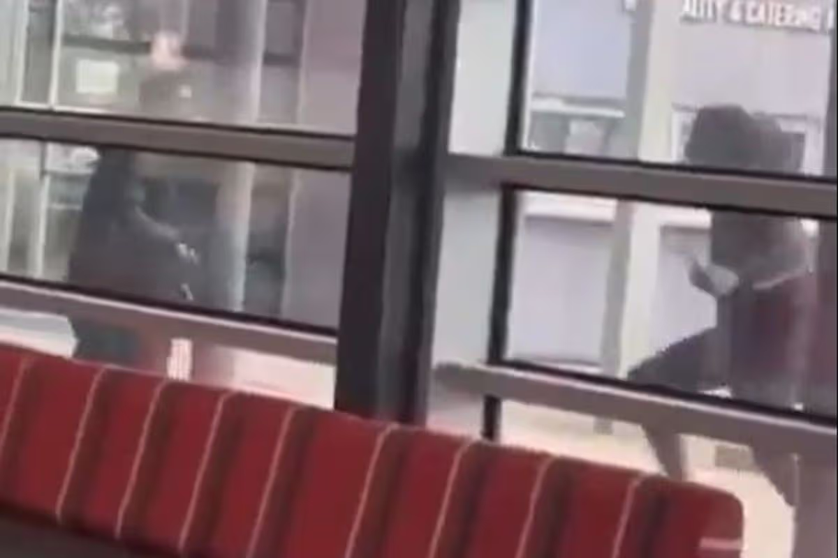 Terrified onlookers flee as video shows 'men clash with large knives' outside college in Slough