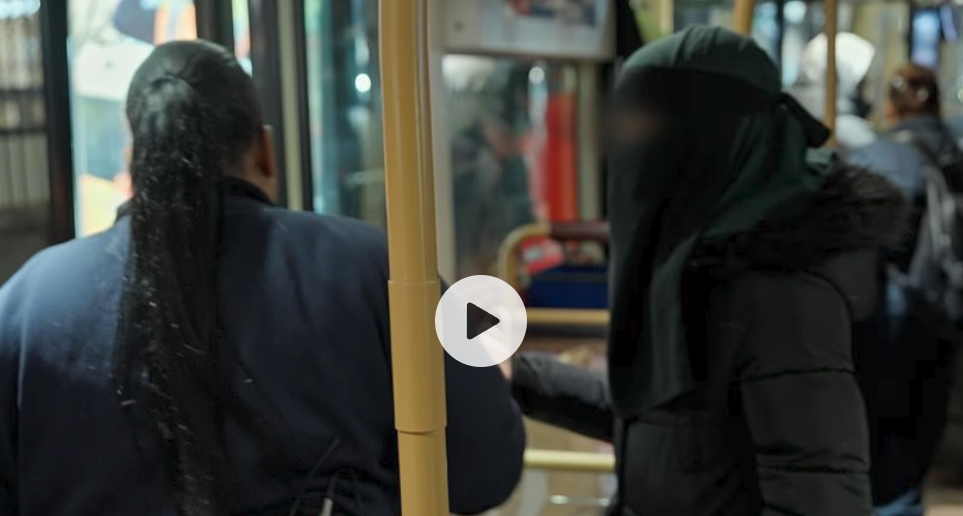 Moment fare dodger claims she doesn't understand English after being caught using her teenage daughter's free pass on packed London bus